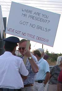 no-balls Police talk to demonstrator