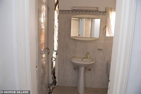 Peter Field and Kayt Field's house torn apart by a landslide